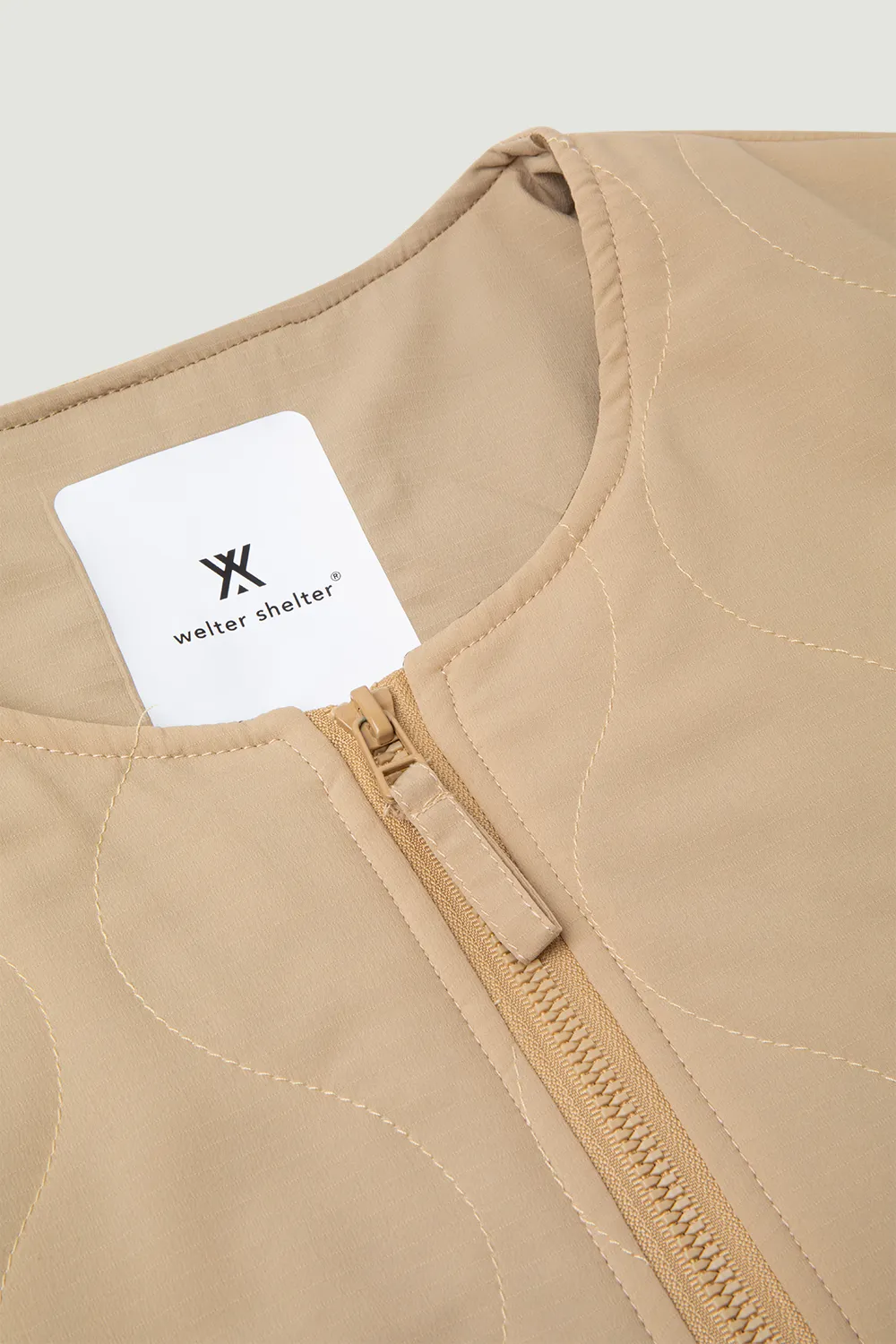 PADDED LINER UNI SS'24 SAFARI SAND