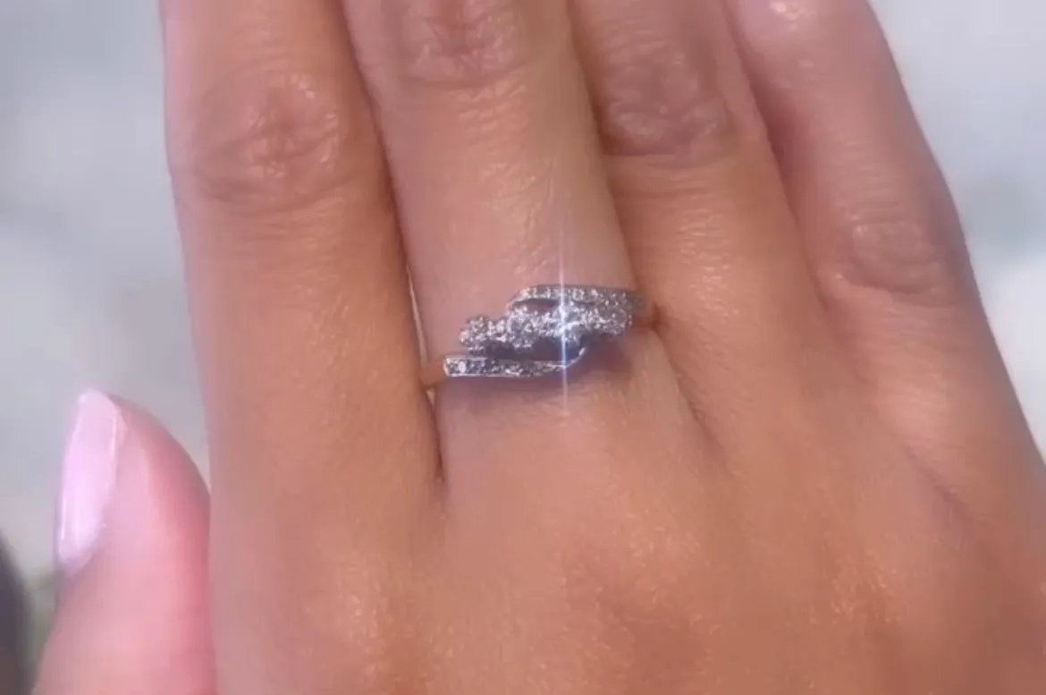 Vintage 18 carat gold diamond swirl ring