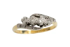 Vintage 18 carat gold diamond swirl ring